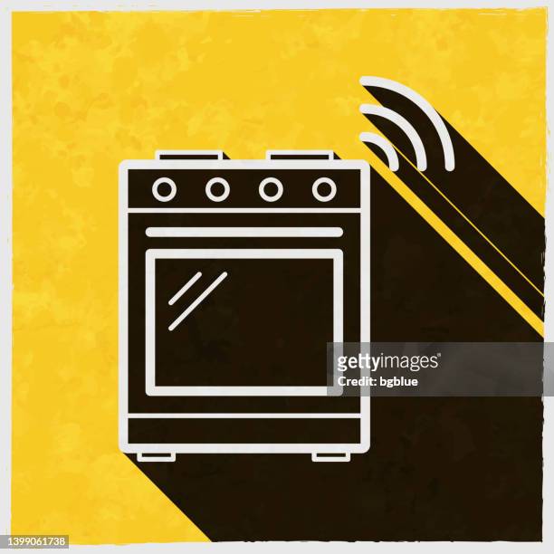 smart range. icon with long shadow on textured yellow background - gas stove burner stock illustrations