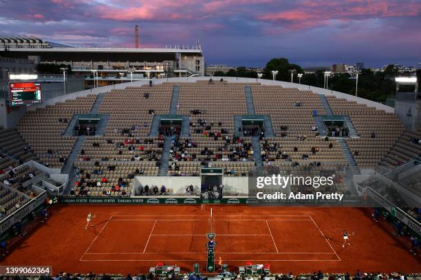 General view of sunset as Chloe Paquet of France plays against Aryna Sabalenka during the Women's Singles First Round match on Day 3 of the French...