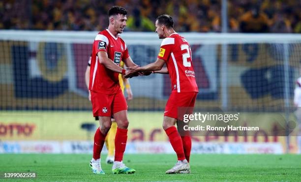 Daniel Hanslik of 1. FC Kaiserslautern celebrate with team mate Hendrick Zuck after he scores the opening goal during the Second Bundesliga Playoffs...