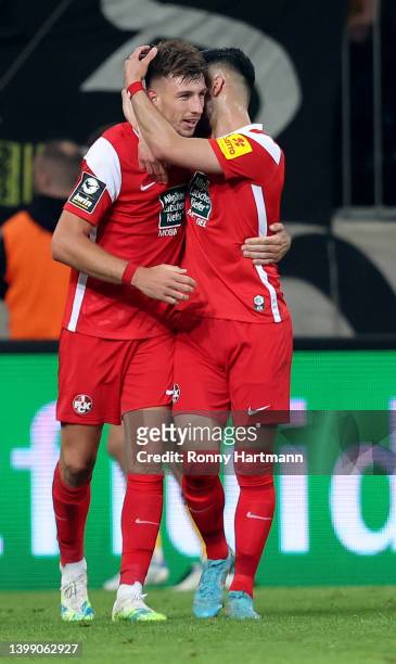 Daniel Hanslik of 1. FC Kaiserslautern celebrate with team mate Hendrick Zuck after he scores the opening goal during the Second Bundesliga Playoffs...