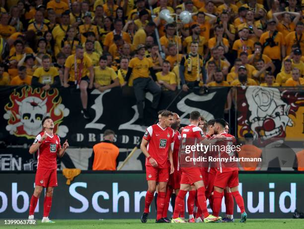 Daniel Hanslik of 1. FC Kaiserslautern celebrates after scoring their side's first goal during the Second Bundesliga Playoffs Leg Two match between...