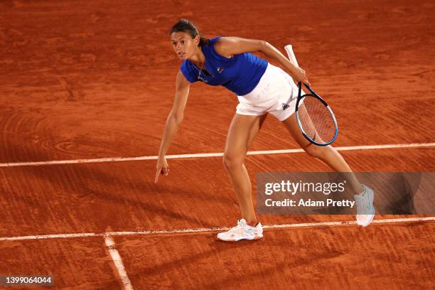 Chloe Paquet of France questions a line call against Aryna Sabalenka during the Women's Singles First Round match on Day 3 of the French Open at...