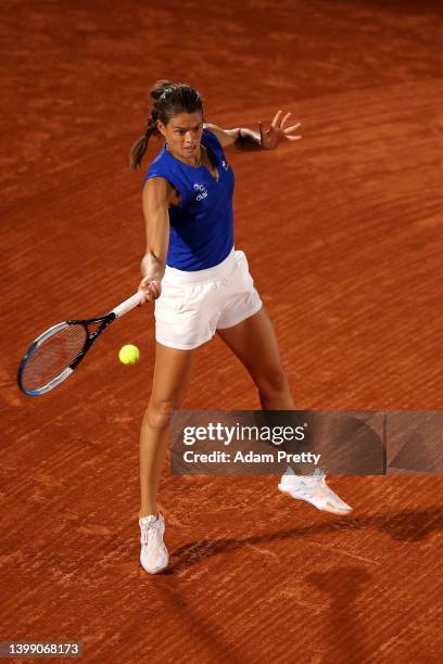 Chloe Paquet of France reacts against Aryna Sabalenka during the Women's Singles First Round match on Day 3 of the French Open at Roland Garros on...