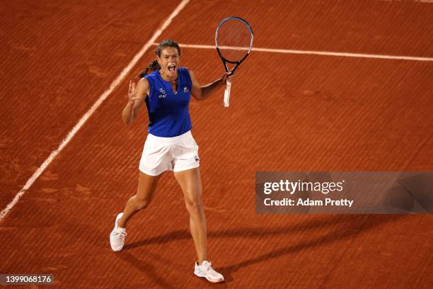 Chloe Paquet of France reacts against Aryna Sabalenka during the Women's Singles First Round match on Day 3 of the French Open at Roland Garros on...