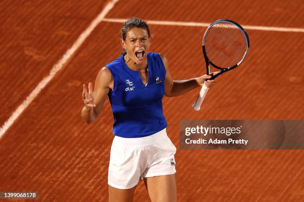 Chloe Paquet of France reacts against Aryna Sabalenka during the Women's Singles First Round match on Day 3 of the French Open at Roland Garros on...