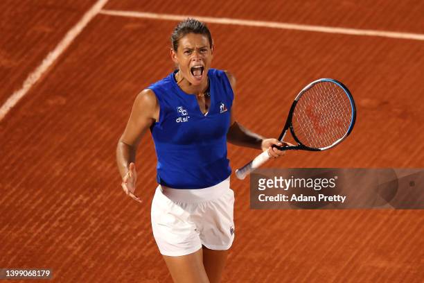 Chloe Paquet of France reacts against Aryna Sabalenka during the Women's Singles First Round match on Day 3 of the French Open at Roland Garros on...