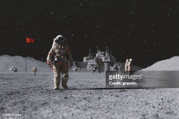 chinese astronauts on moon with permanent base - roupa de astronauta imagens e fotografias de stock
