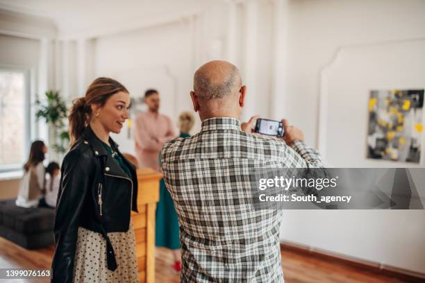 taking pictures of art - museum visit stock pictures, royalty-free photos & images