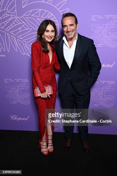 Elsa Zylberstein and Jean Dujardin attend the "Cannes 75" Anniversary Dinner during the 75th annual Cannes film festival at on May 24, 2022 in...