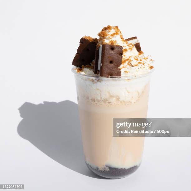 close-up of iced coffee on white background - blended coffee drink stock pictures, royalty-free photos & images