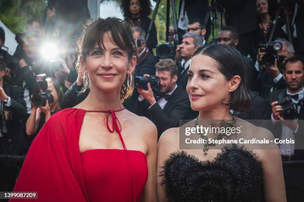 Sophie Marceau and Amira Casar attend the 75th Anniversary celebration screening of "The Innocent " during the 75th annual Cannes film festival at...