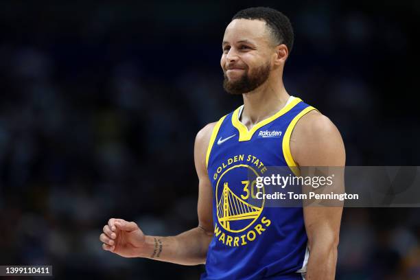 Stephen Curry of the Golden State Warriors reacts to a play during the second quarter against the Dallas Mavericks in Game Four of the 2022 NBA...