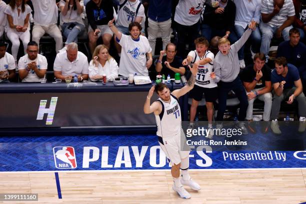 Luka Doncic of the Dallas Mavericks celebrates a three point basket during the third quarter against the Golden State Warriors in Game Four of the...
