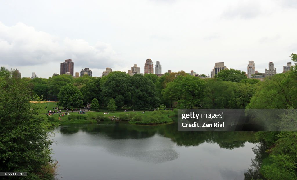 Central Park's Great Lawn and Turtle Pond with Manhattan skyline in background, New York City