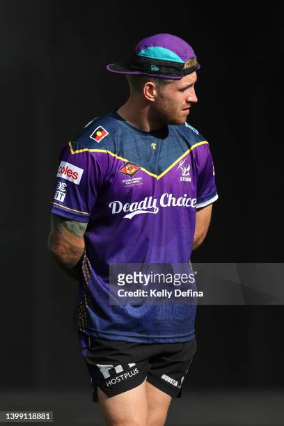 Cameron Munster of the Storm reacts during a ceremony after a Melbourne Storm media opportunity at Gosch's Paddock on May 25, 2022 in Melbourne,...