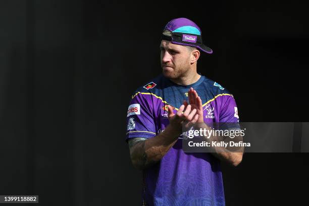 Cameron Munster of the Storm reacts during a ceremony after a Melbourne Storm media opportunity at Gosch's Paddock on May 25, 2022 in Melbourne,...