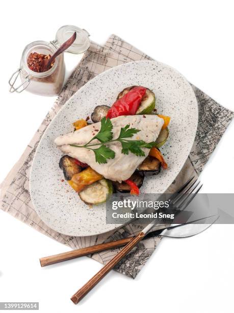 boiled dorado fish with grilled vegetables on white background isolated - dolphin fish stock pictures, royalty-free photos & images