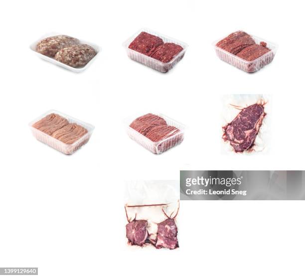 set of various raw uncooked minced and whole meat in recycled plastic pack on white background isolated - meat packaging stockfoto's en -beelden