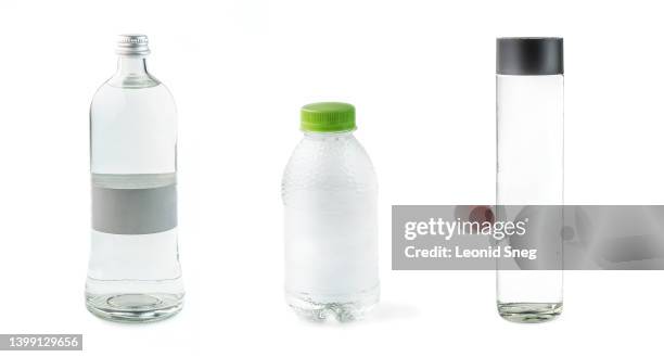 set of various plastic and glass bottles with spring clean water on white background isolated - water bottle on white stock pictures, royalty-free photos & images