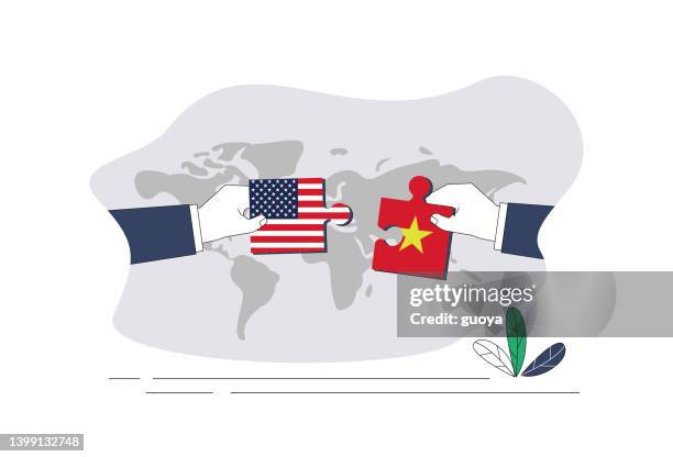 american flag and vietnam flag puzzle. - vietnam stock illustrations