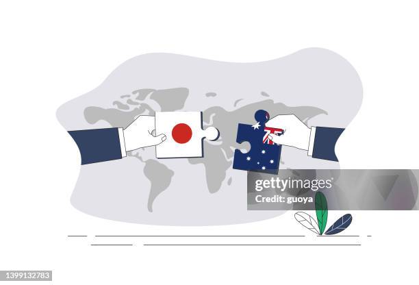 japanese flag and australian flag puzzle. - japanese flag stock illustrations