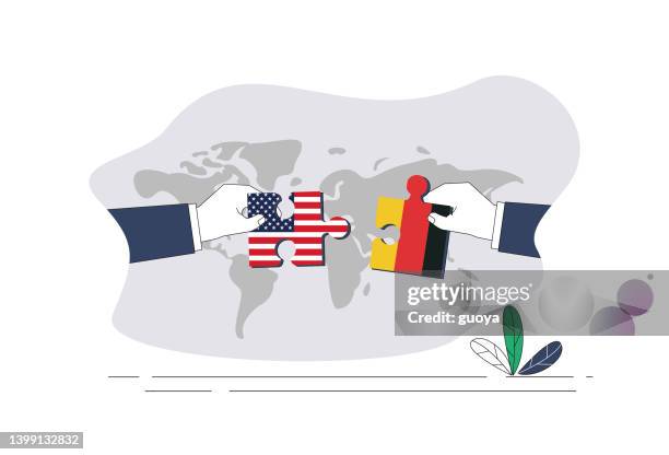 amerikanische flagge und deutsche flagge puzzle. - tradition stock-grafiken, -clipart, -cartoons und -symbole