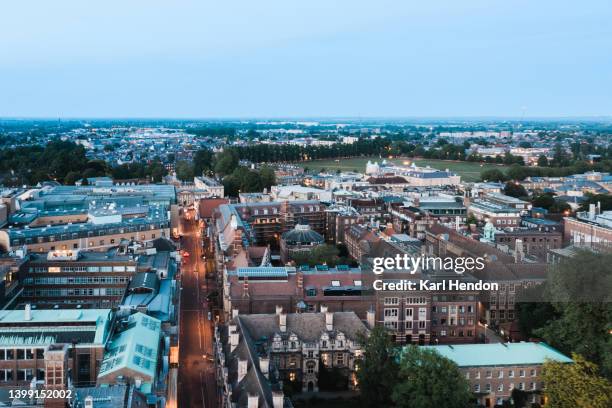 an elevated night-time view of cambridge, uk - cambridge union stock pictures, royalty-free photos & images