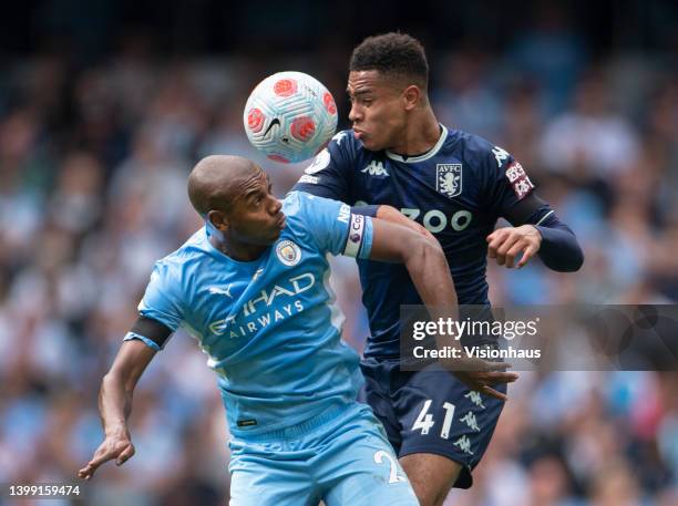 Jacob Ramsey of Aston Villa and Fernandinho of Manchester City in action during the Premier League match between Manchester City and Aston Villa at...