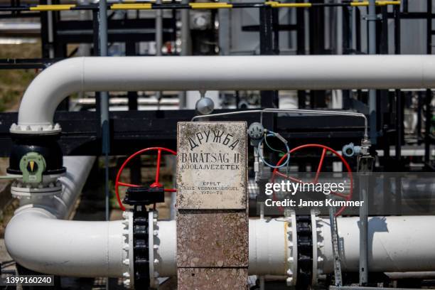 Stone commemorates the Friendship 2 crude oil pipeline in the Duna oil refinery on May 24, 2022 in Szazhalombatta, Hungary. MOL Hungarian Oil & Gas...