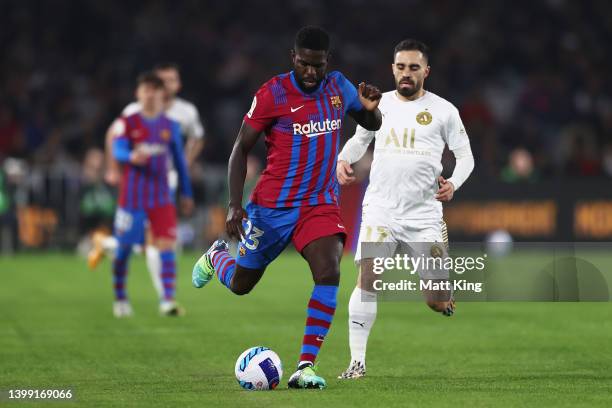 Samuel Umtiti of FC Barcelona controls the ball during the match between FC Barcelona and the A-League All Stars at Accor Stadium on May 25, 2022 in...