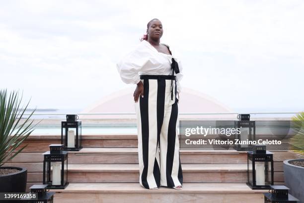 Deborah Lukumuena poses prior to the Kering Women In Motion Talk during the 75th annual Cannes film festival at Majestic Hotel on May 25, 2022 in...