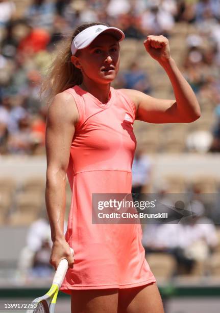 Aliaksandra Sasnovich of Belarus celebrates match point against Emma Raducanu of Great Britain during the Women's Singles Round 2 on Day Four of The...