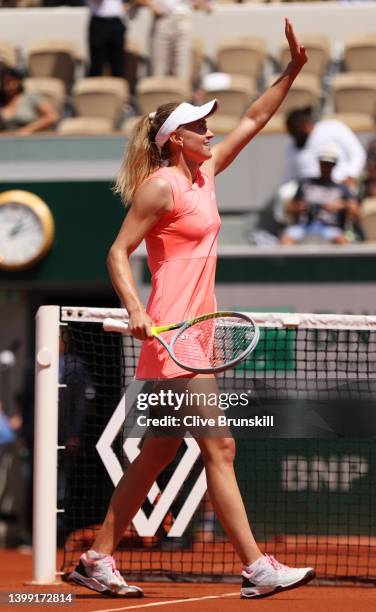 Aliaksandra Sasnovich of Belarus celebrates victory against Emma Raducanu of Great Britain following the Women's Singles Round 2 on Day Four of The...