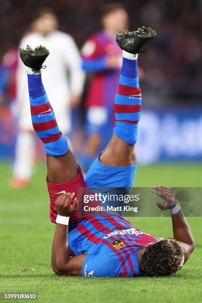 Adama Traore of FC Barcelona falls over after scoring during the match between FC Barcelona and the A-League All Stars at Accor Stadium on May 25,...