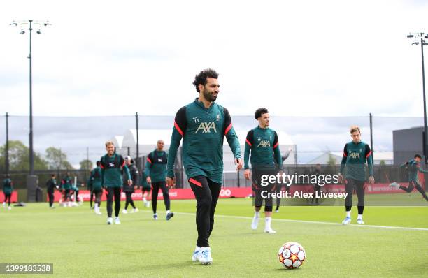 Mohamed Salah of Liverpool looks on during a training session at AXA Training Centre on May 25, 2022 in Kirkby, England.