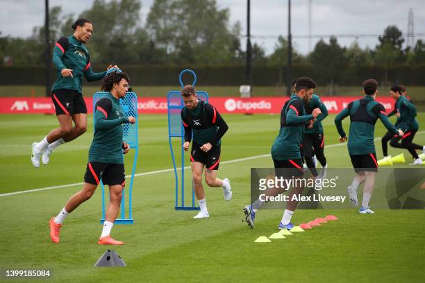Trent Alexander-Arnold of Liverpool and teammates take part in a training session at AXA Training Centre on May 25, 2022 in Kirkby, England.