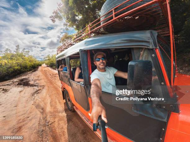 taking a selfie on the road trip in nature - guidebook stock pictures, royalty-free photos & images