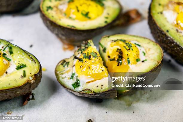 baked eggs with avocado - eggs benedict stock pictures, royalty-free photos & images