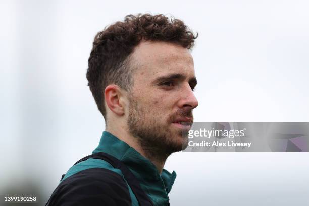 Diogo Jota of Liverpool looks on during a training session at AXA Training Centre on May 25, 2022 in Kirkby, England.
