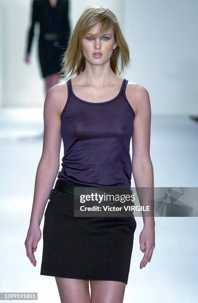 Amy Lemons walks the runway during the Calvin Klein Ready to Wear Fall/Winter 2001-2002 fashion show as part of the New York Fashion Week on February...