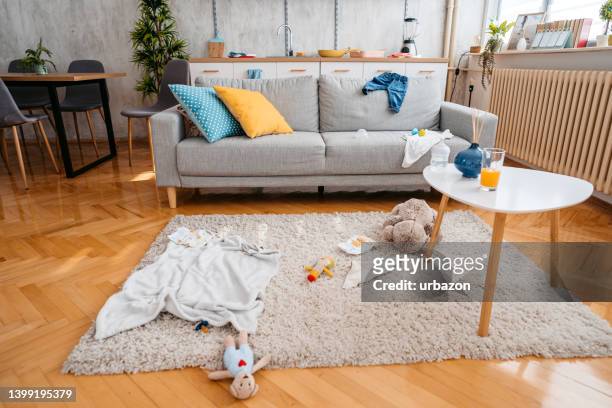 messy living room - life of teddy stock pictures, royalty-free photos & images