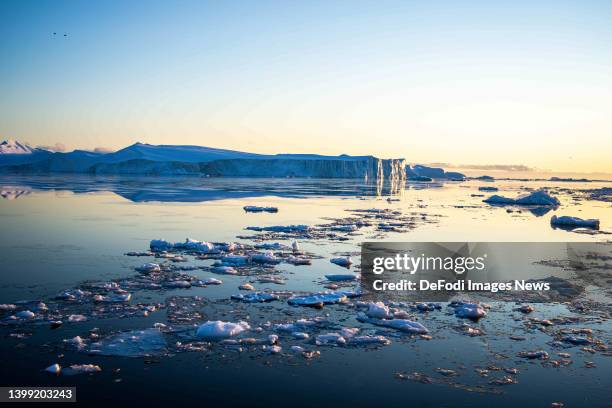 Ilulissat, Greenland Icebergs, calved from the Sermeq Kujalleq glacier, float in the Ilulissat Icefjord. 2022 will mark one of the biggest ice melt...