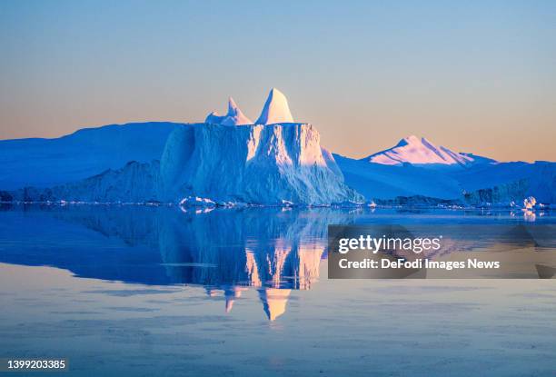 Ilulissat, Greenland Icebergs, calved from the Sermeq Kujalleq glacier, float in the Ilulissat Icefjord. 2022 will mark one of the biggest ice melt...