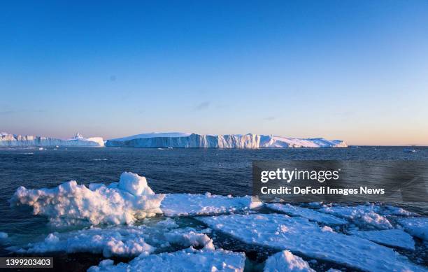 Ilulissat, Greenland Icebergs, calved from the Sermeq Kujalleq glacier, float in the Ilulissat Icefjord. 2022 will mark one of the biggest ice melt...