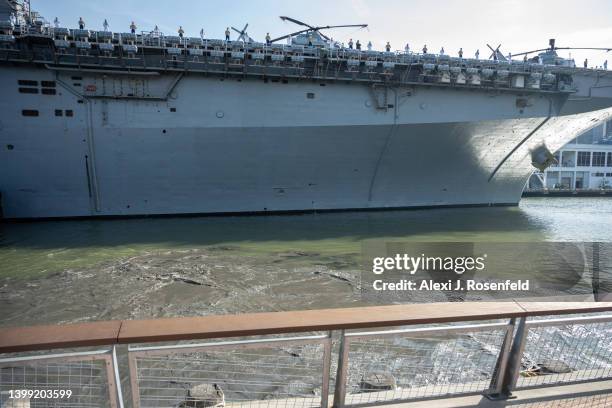 Oil and dirt fill the Hudson River as the USS Bataan and other vessels dock for Fleet Week 2022 as seen from the Intrepid Museum on May 25, 2022 in...