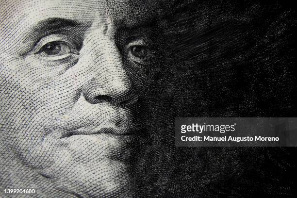vanishing benjamin franklin - 100 dollar banknote - recession stock pictures, royalty-free photos & images