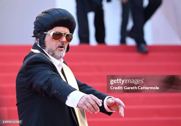 An Elvis impersonator is seen ahead of the screening of "Elvis" during the 75th annual Cannes film festival at Palais des Festivals on May 25, 2022...