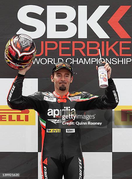 Max Biaggi of Italy and rider of the Aprilia Racing Team Aprillia celebrates winning race one of the 2012 Superbike FIM World Championship at Phillip...