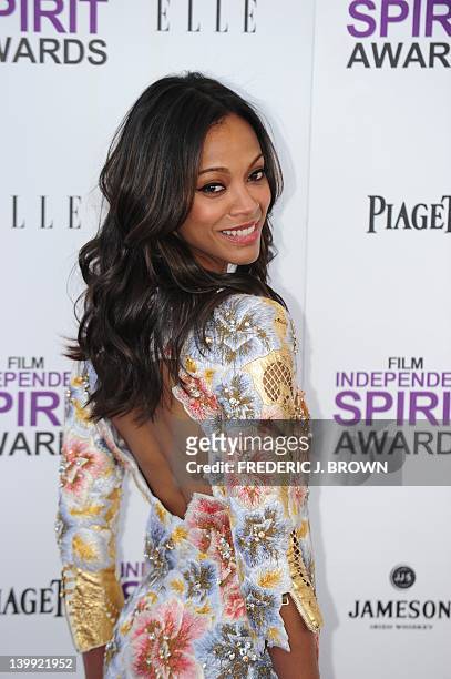 Actress Zoe Saldana arrives on the red carpet on February 25, 2012 for the Independent Spirit Awards in Santa Monica, California. AFP PHOTO/FREDERIC...