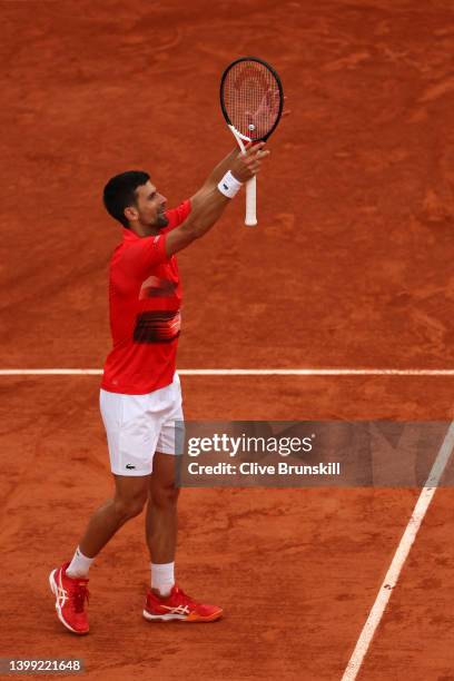 Novak Djokovic of Serbia celebrates victory against Alex Molcan of Slovakia following the Men's Singles Round 2 on Day Four of The 2022 French Open...